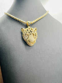 Silver over gold ice chain and pendant