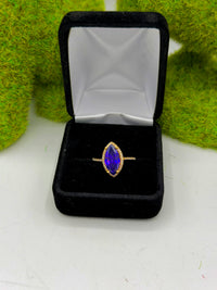 14k This ring is similar to the Lisbon ring, featuring a purple marquise-cut center stone CZ stones