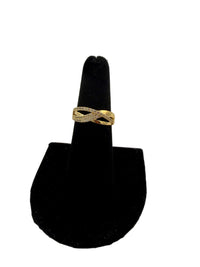 This is a Shy Creation 14k yellow gold diamond bridge ring with (Cz) stones round diamonds.