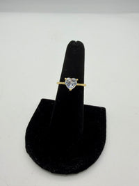14k yellow gold solitaire engagement ring featuring a heart-shaped center stone.