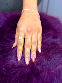 14k gold diamond bypass ring featuring two clover-shaped motifs. (Cz) stones