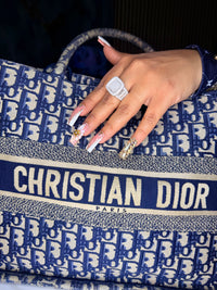 Silver and moissanite ring