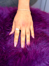 14k cluster ring featuring several marquise-cut stones (Cz) stones