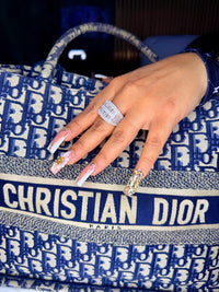 Silver and moissanite ring